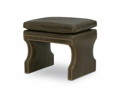 Moss green leather ottoman with pillow seat and nail head trim.