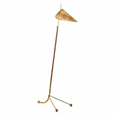 Elegant Aerin Moresby floor lamp with antique brass finish, showcasing a classic design in its side profile view.