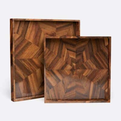 Side view of two XL Square Banana Bark Trays in brown, showcasing intricate wood grain patterns.