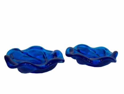 Vintage Fenton blue glass dish, close-up of intricate design, circa 1950s.