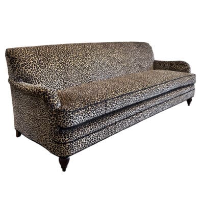 Leopard print sofa with tight back and spring down cushion in Bottle Green Velvet.