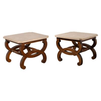 Pair of ornate travertine coffee tables in vintage condition, each featuring an oval design and fruitwood finish.