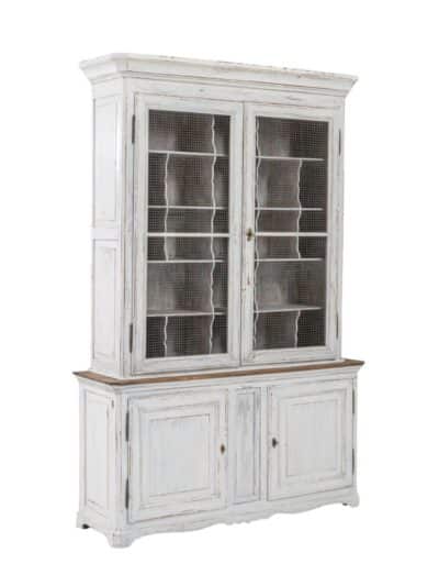 Antique French cabinet in white, distressed finish with wire door fronts and unique cubby shelves.
