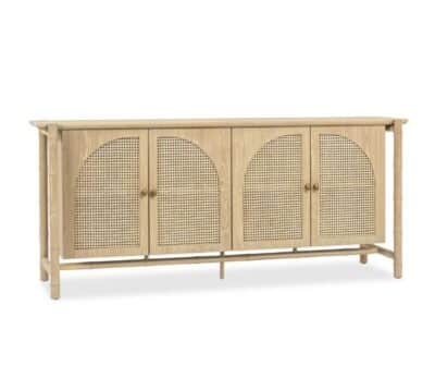Oak wood cabinet with brass handles, cane doors, and wire management holes