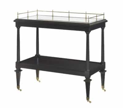 Elegant ebony bar cart with intricate brass accents and mirrored top.