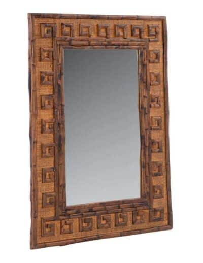Antiqued tortoise rattan framed mirror with intricate Greek key design.