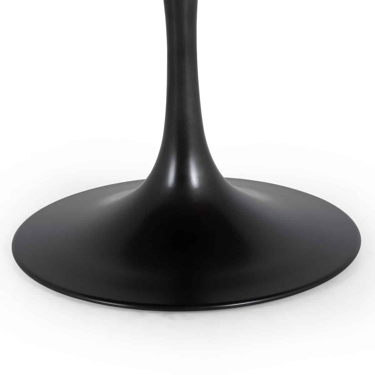 Close-up of Powell Dining Table, showcasing its elegant black iron base and pristine white marble top.