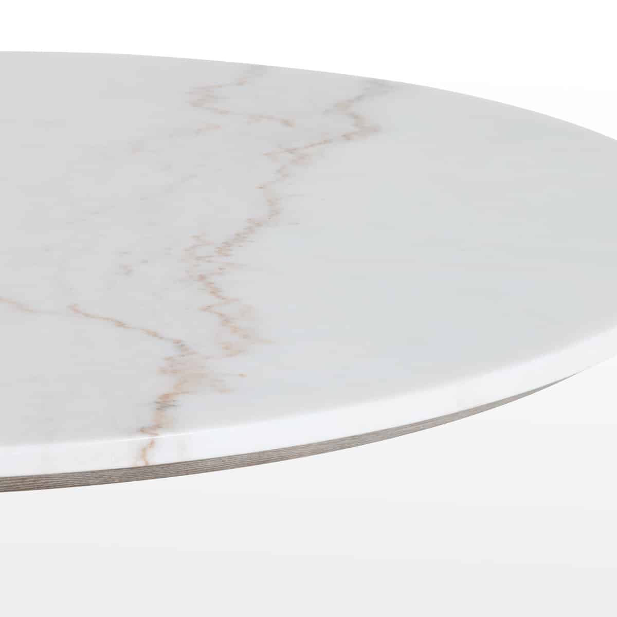 Close-up of Powell Dining Table in rustic black iron finish with white marble top, showcasing elegant tulip base.
