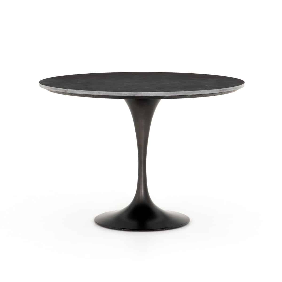 Stylish round dining table with black iron base and marble top, perfect for modern home decor.
