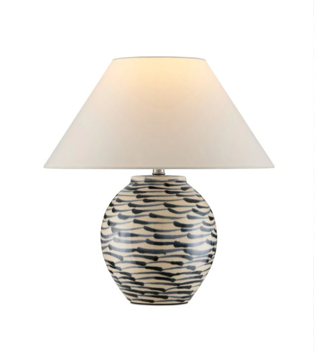 Close-up of Minnow Blue Table Lamp featuring navy blue and beige ceramic finish, clear silver cord, and elegant design.