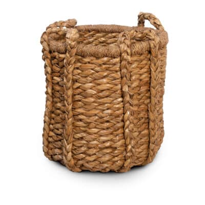 Close-up of large round woven seagrass log basket with handles, available in various sizes and locations.