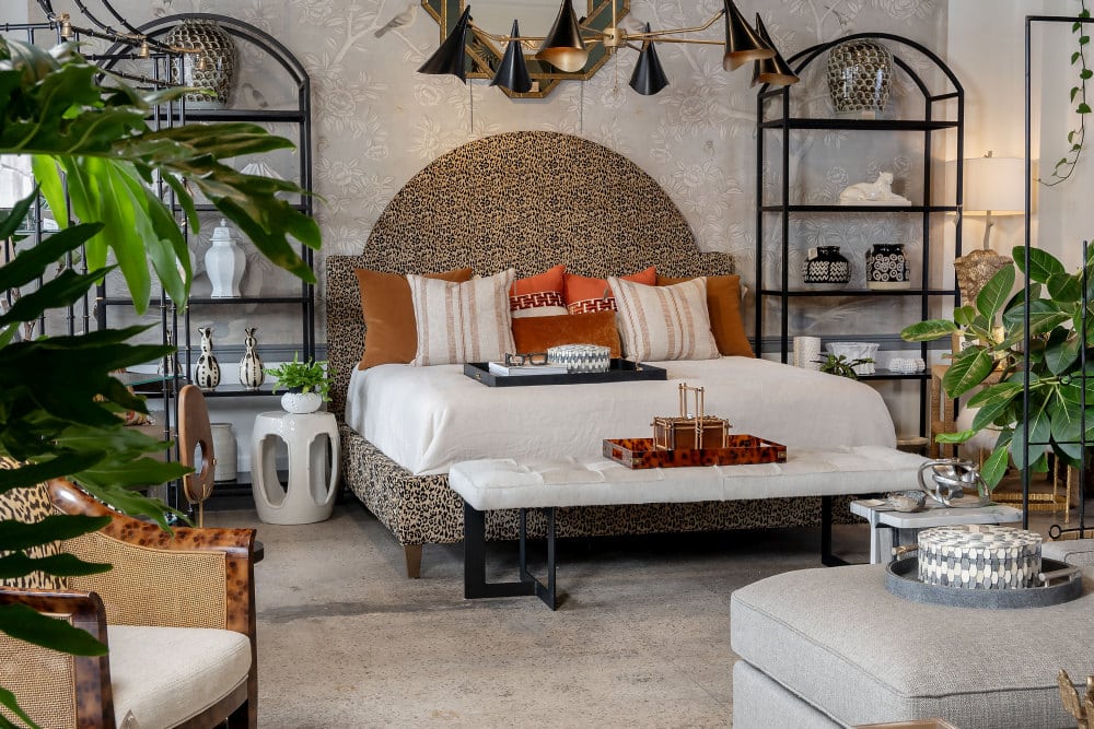 Valerie King Bed in Jaguar Print, upholstered headboard and footboard, weathered gray finish.