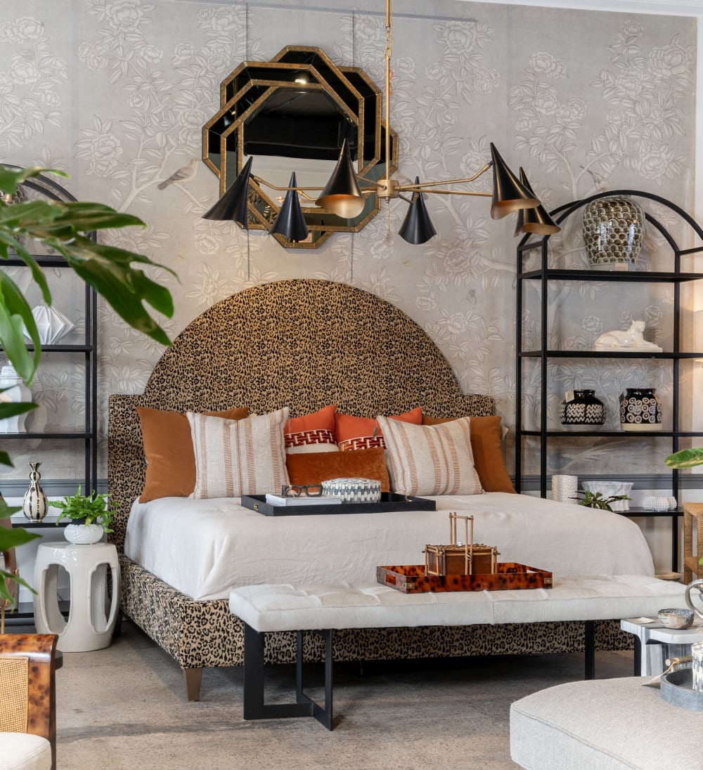 Stylish Valerie King Bed in striking Jaguar Print, featuring plush cushions and an elegant headboard, perfect for adding luxury to your bedroom.
