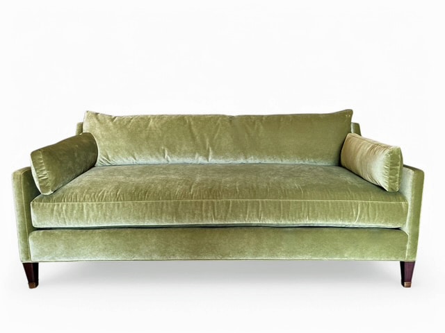 Striking Meadow Velvet Sofa with Pecan Finish Legs and Brass Fittings, perfect for any living space.