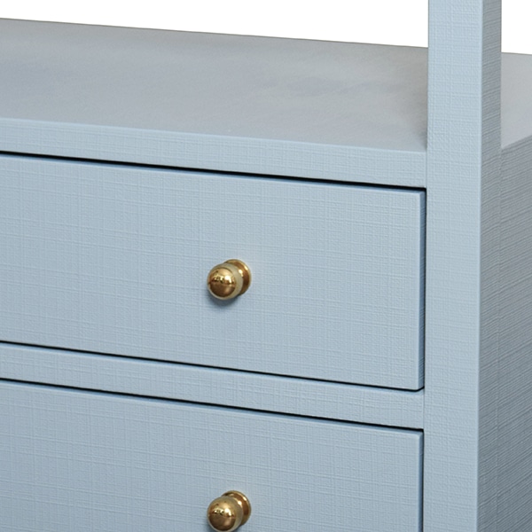 Close-up of Morton Night Stand in Textured Linen, featuring polished brass hardware and a white finish.