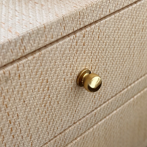 Close-up of Morton Night Stand in Textured Linen, featuring Polished Brass Hardware.