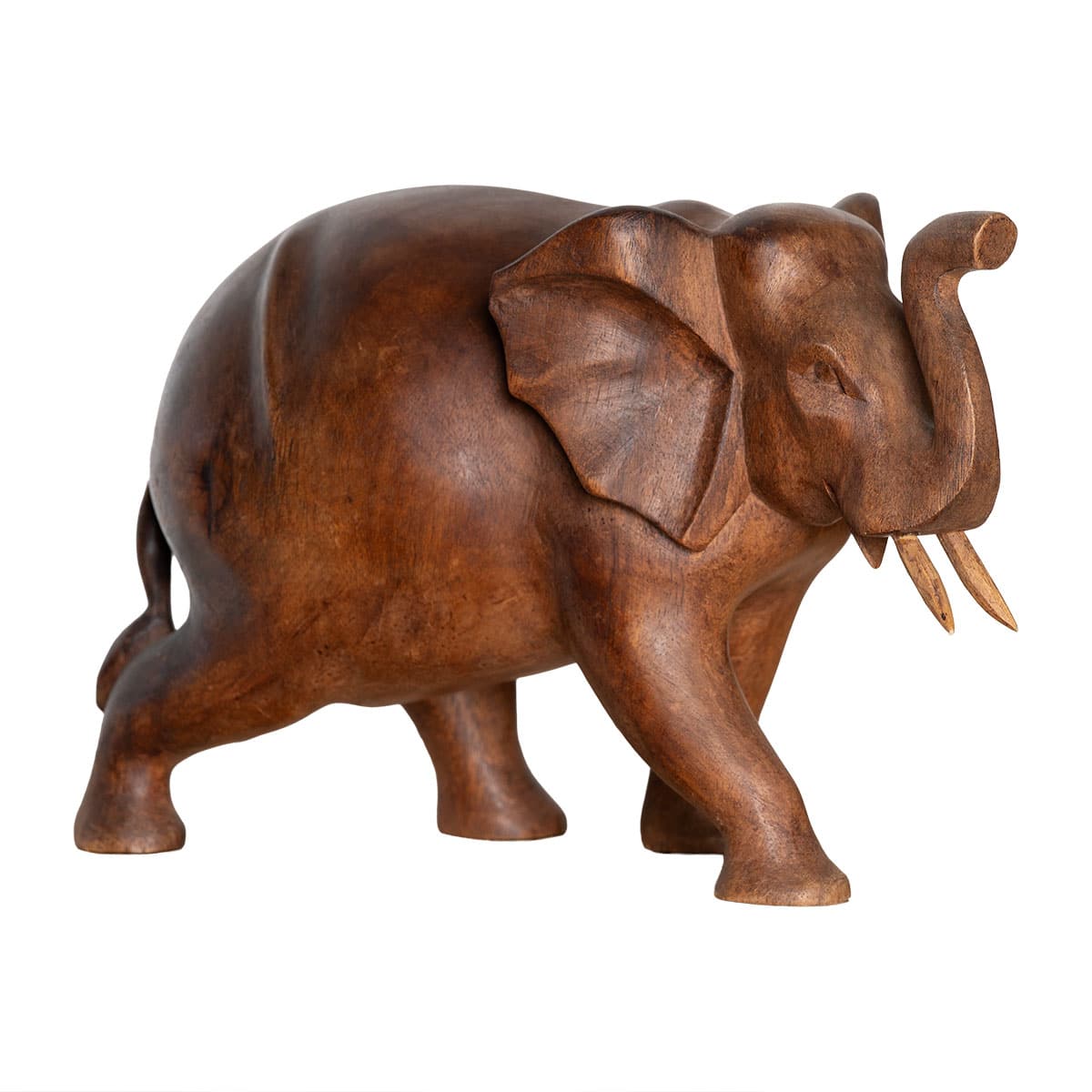 Handcrafted wooden elephant statue with raised trunk and two tusks, showcasing intricate carving details and vintage patina.