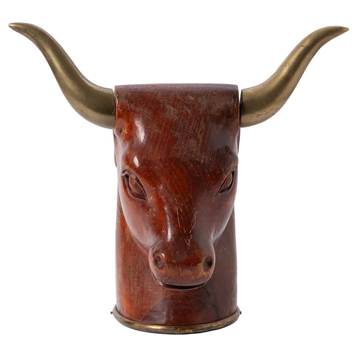 Close-up of vintage wooden bull sculpture with brass horns, circa 1960s.