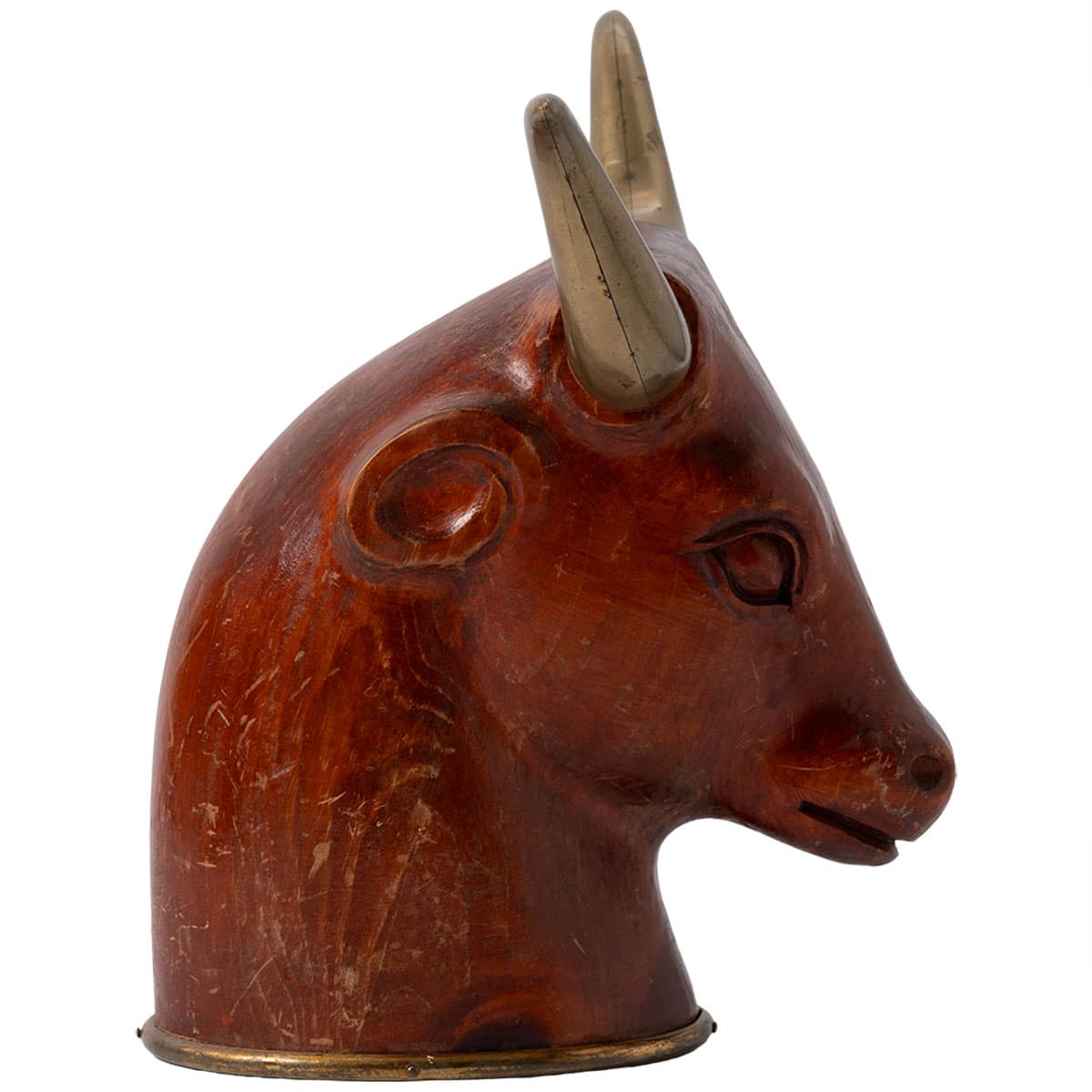 Close-up of vintage wooden bull head sculpture with brass horns, mid-century style.