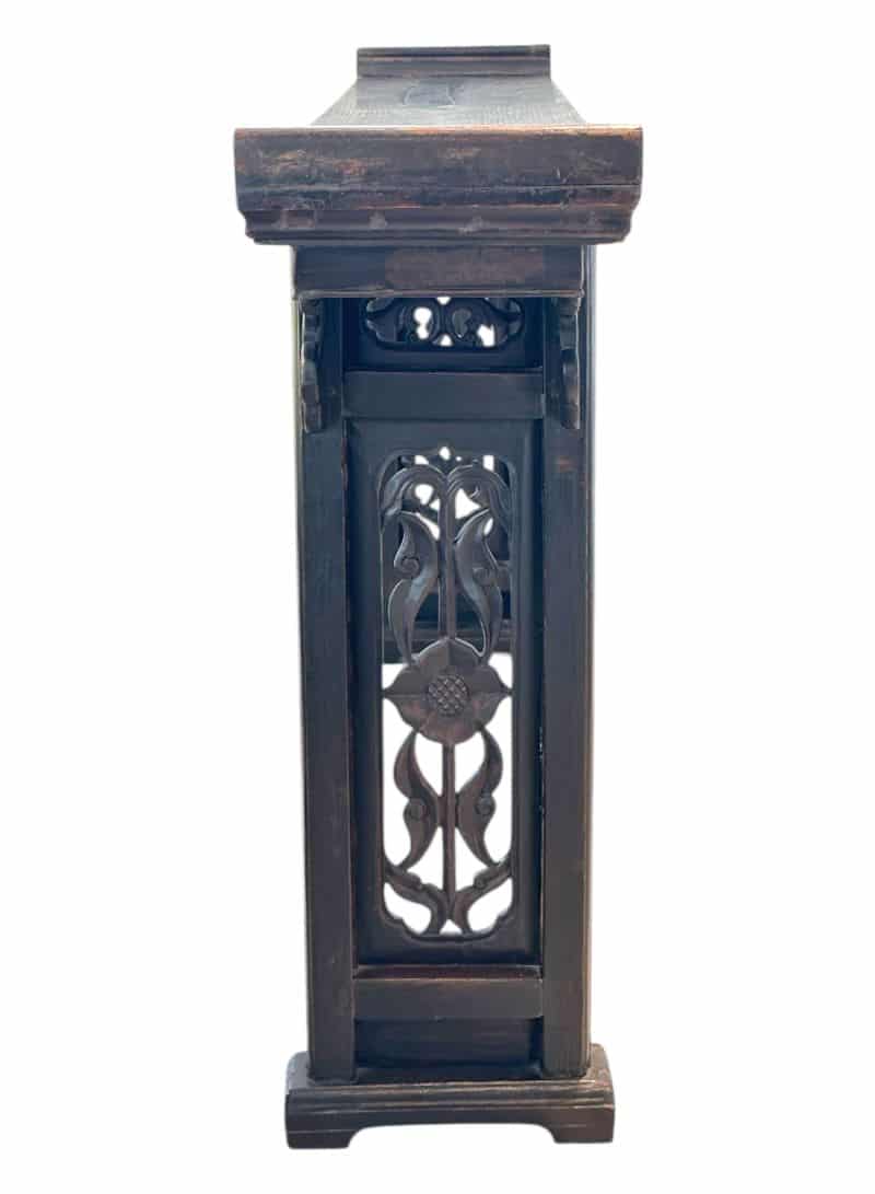 Antique Chinese double-sided console, aged lacquered finish, ornate carved fretwork on legs and apron.