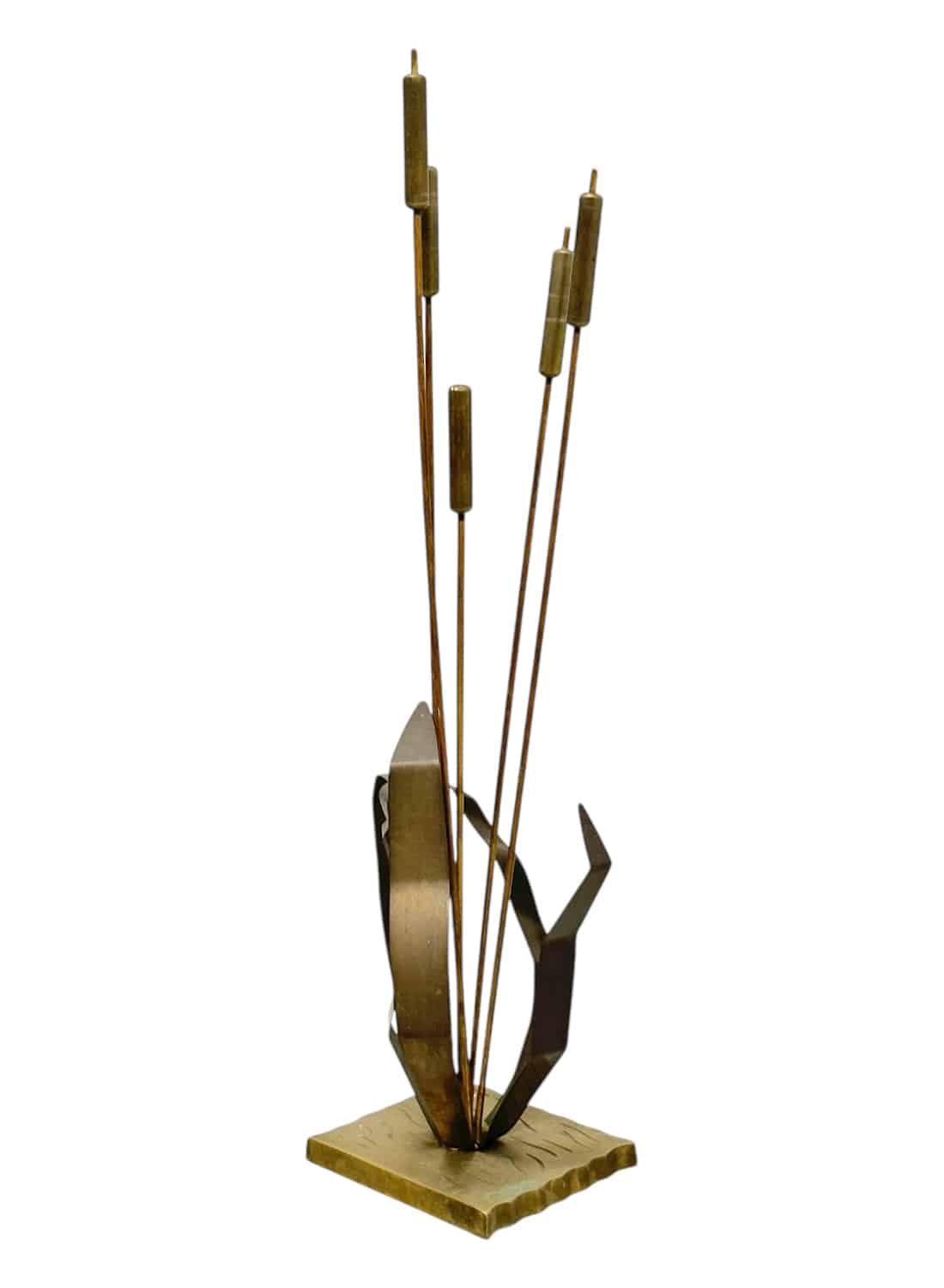 Close-up of vintage brass cattail sculpture with intricate design and reflective sheen.