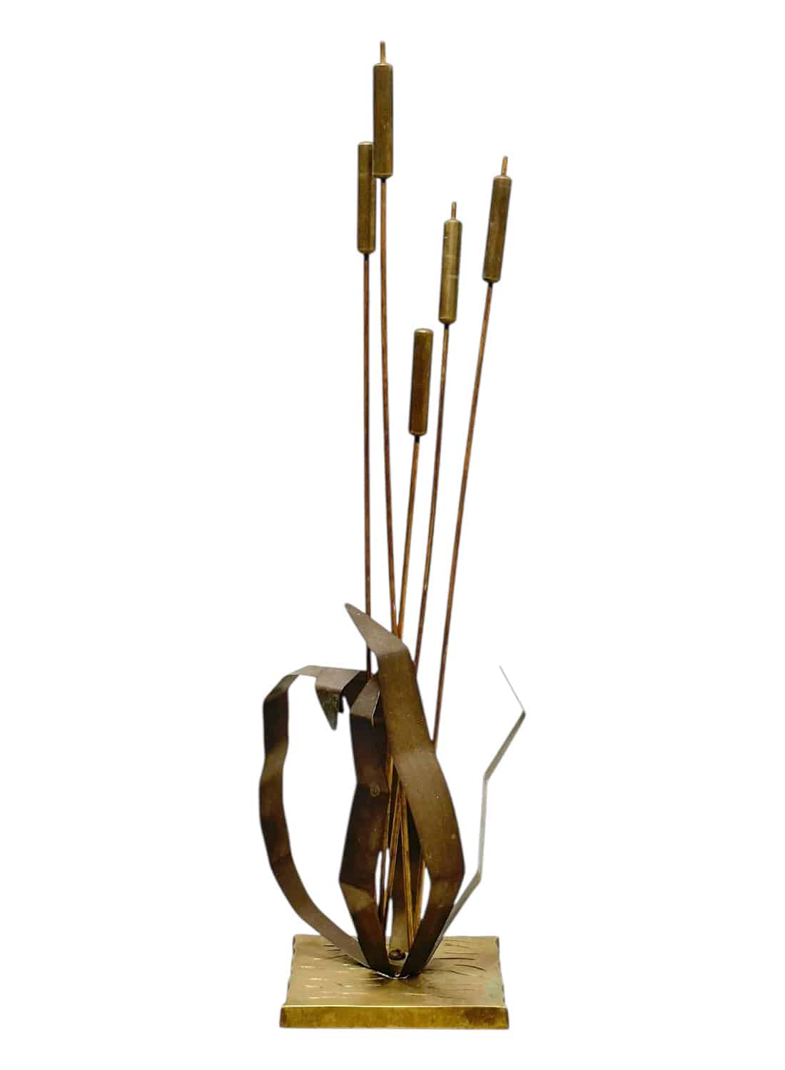 Close-up of vintage brass cattail sculpture with intricate details.