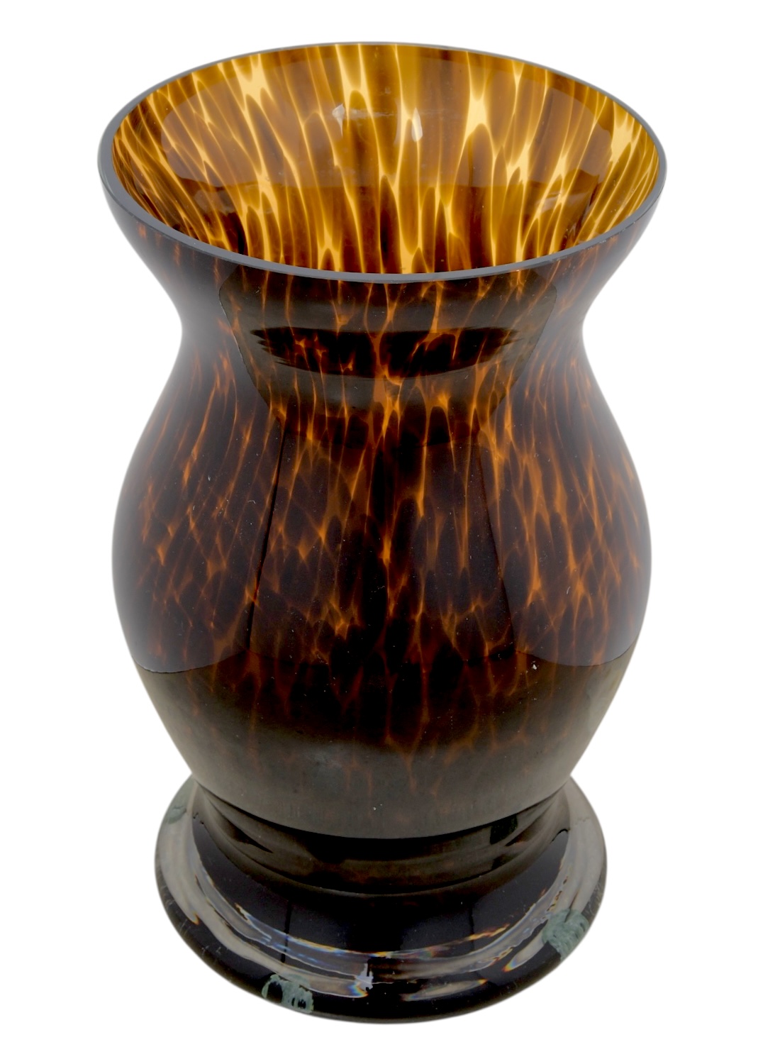 Close-up of large tortoise pattern hurricane vase with intricate design.