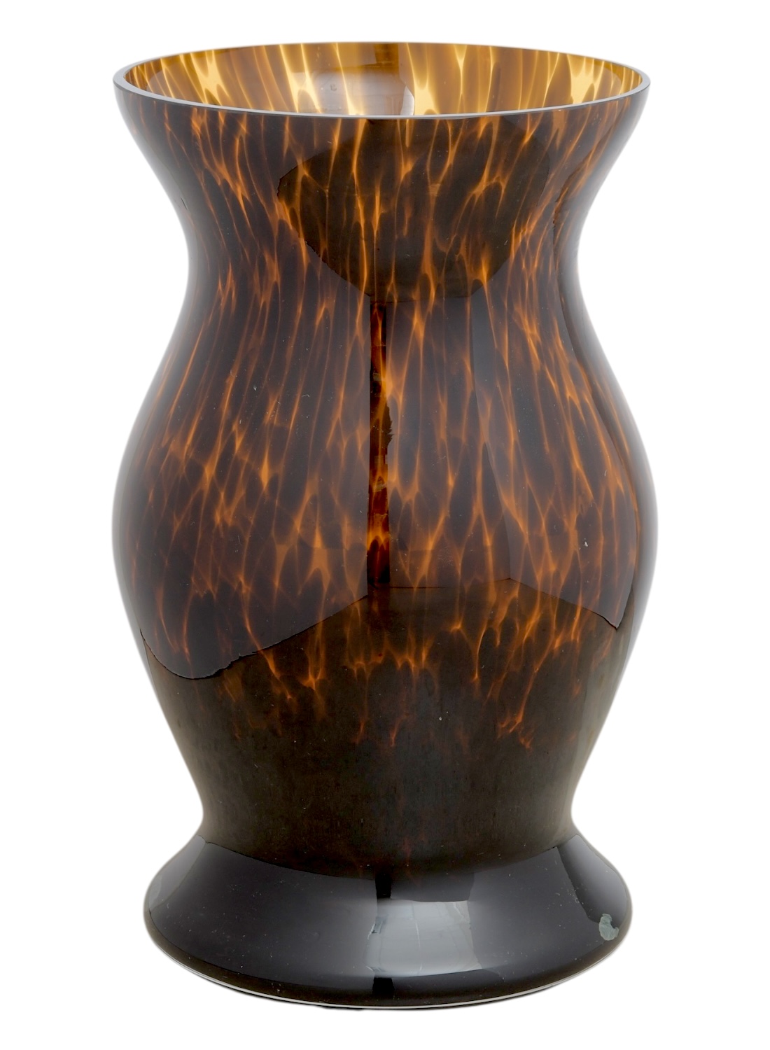 Close-up of large tortoise pattern glass hurricane vase.