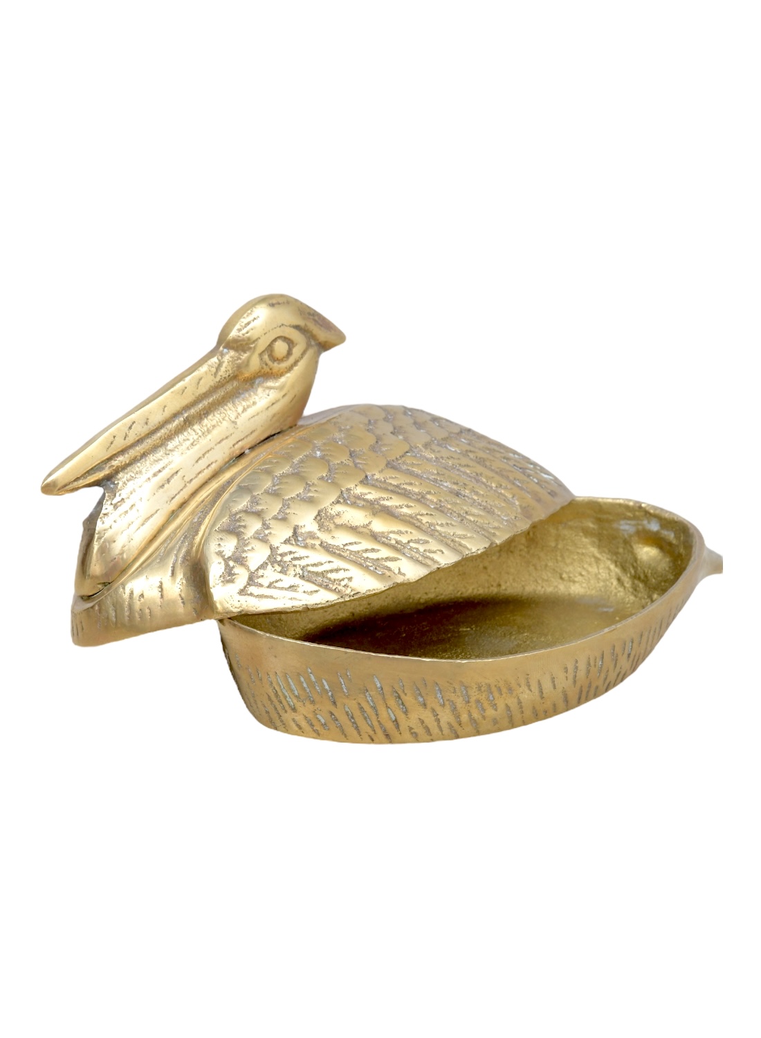 Close-up of vintage brass pelican box, showcasing intricate details and craftsmanship.