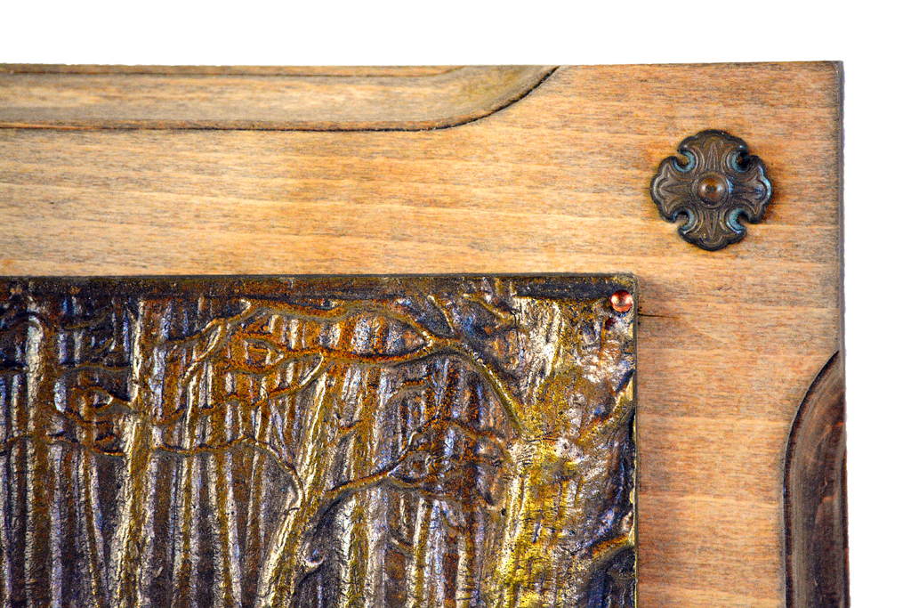 Antique French bronze boar wall plaque with relief depiction of wild boars, mounted on walnut, circa 1860.