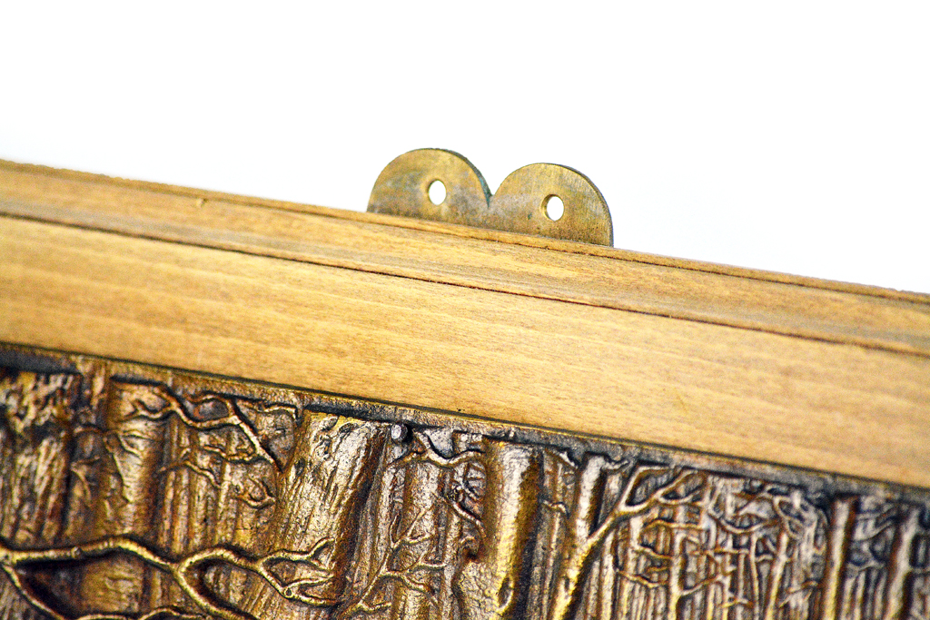 Antique French bronze wall plaque with relief depiction of wild boars, mounted on walnut, circa 1860.