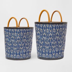 Large blue and white Izzie nesting basket with handles, set against a white background.