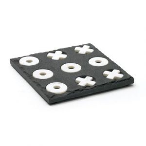 Black and white marble tic tac toe game with 12 pieces on a gray surface.