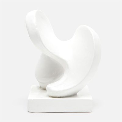 Abstract white concrete sculpture on display.