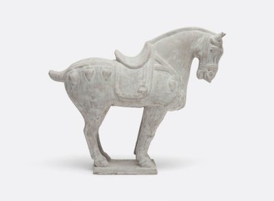 Concrete Chinese horse sculpture on display.