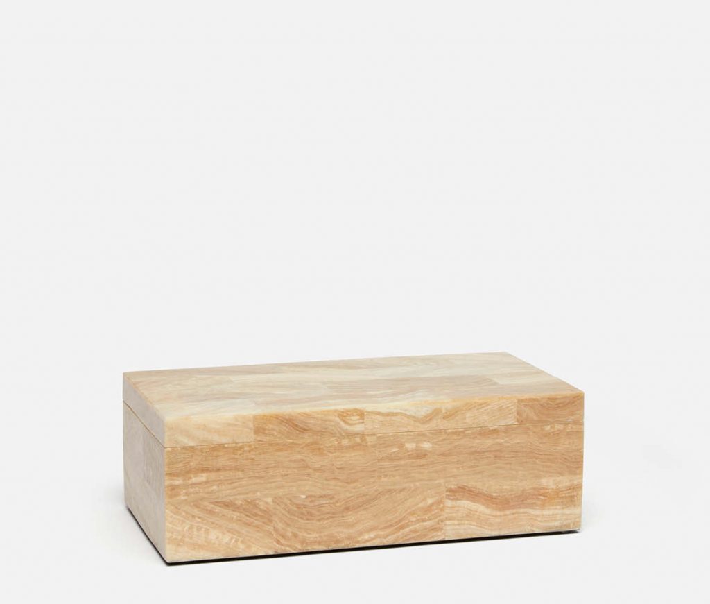 A rectangular wooden box with a marbled pattern on its exterior, placed against a white background.