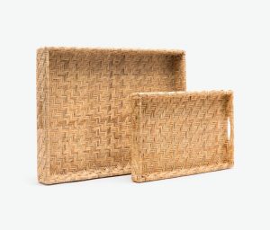 Two woven rattan trays with a chevron pattern, one larger and one smaller, displayed against a white background.