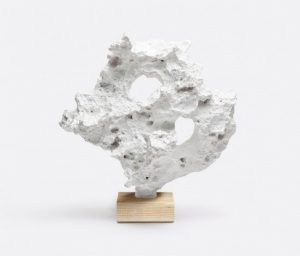 White faux coral on a banana leaf wrapped base