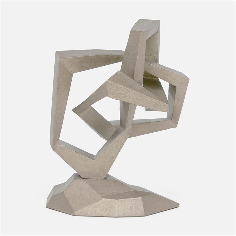 A modern sculpture with a geometric design, featuring abstract shapes and forms in a metallic finish.