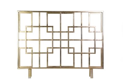 Gold and silver metal decorative fireplace screen with geometric pattern.