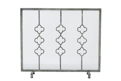 Metal quatrefoil fireplace screen with a deep ocean finish