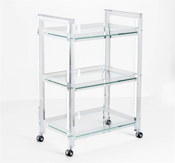 Clear acrylic and glass bar cart with three shelves, showcasing its transparent design.