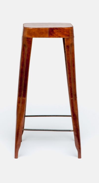 A tall, wooden bar stool with a leather-wrapped frame and contrast stitching.