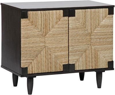Small wooden buffet with two doors and a woven design, featuring black legs and a simple pattern on the front panel.