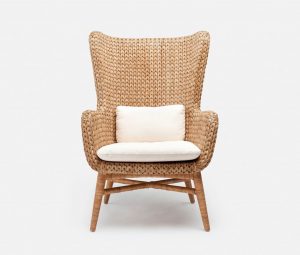 Wicker chair with a cushioned seat and back, positioned against a white background.