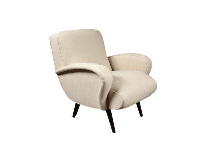 A beige mid-century style armchair with a modern design, featuring curved lines and a classic silhouette.