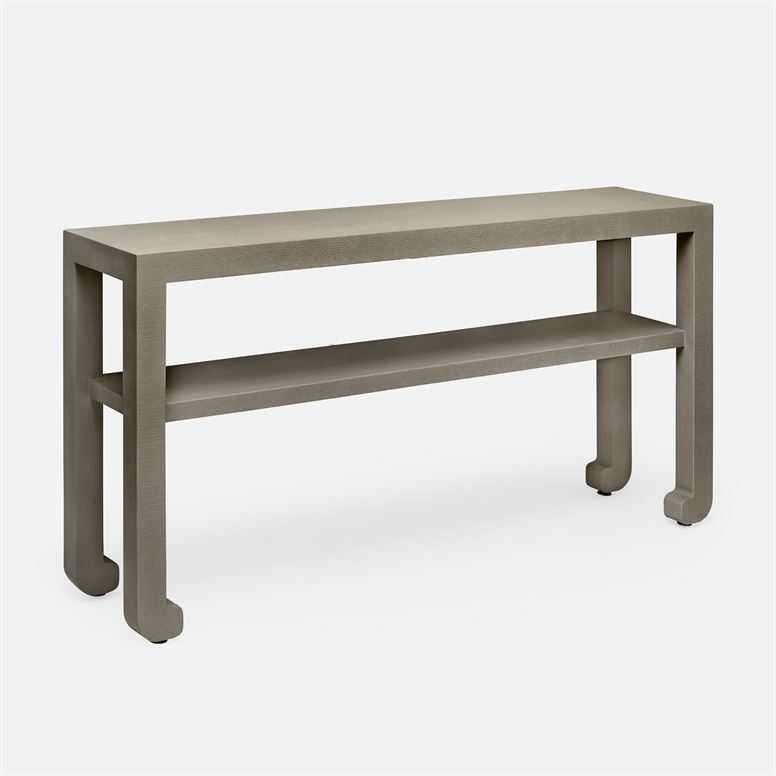 A long, rectangular, modern console table with a metallic finish and a flat top, set against a white background.