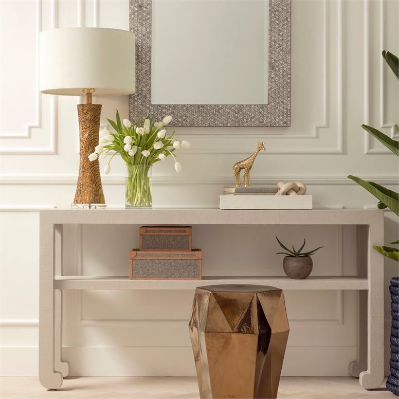 A modern ming style faux raffia console with a sleek design and a shiny metallic finish It features a large rectangular top