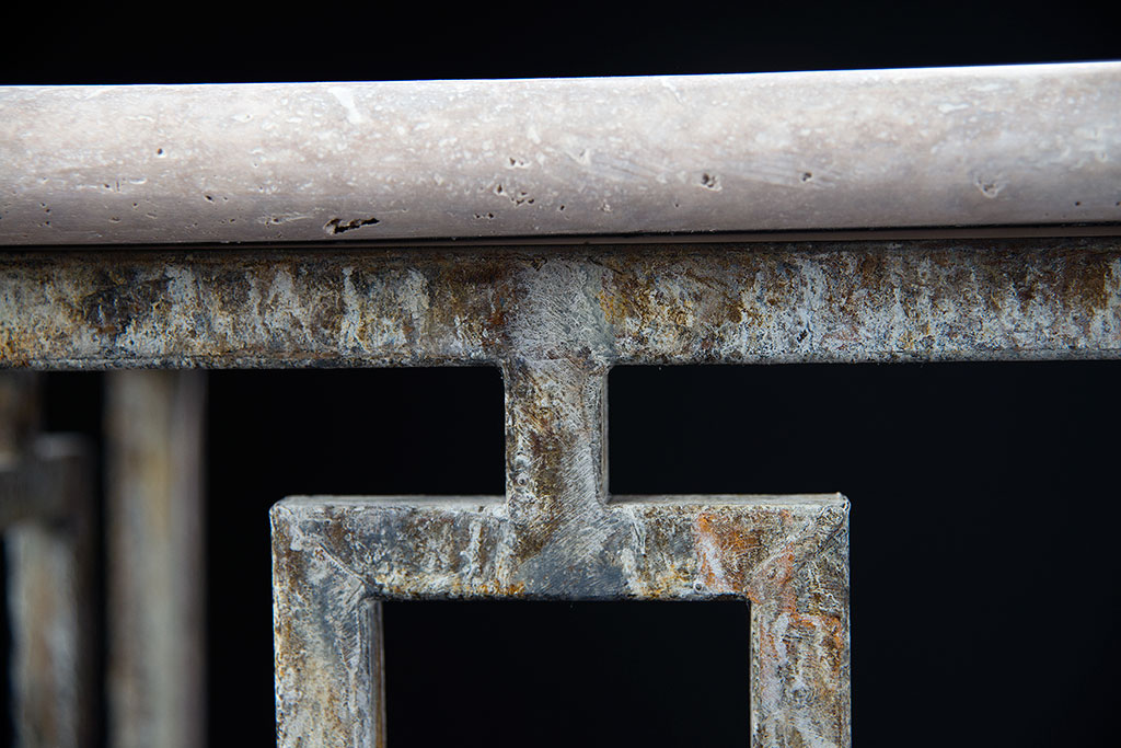 Hewitt Console with Light Travertine Top in Deep Ocean Finish featuring a metal frame with a natural rustic and rusty whitewash finish