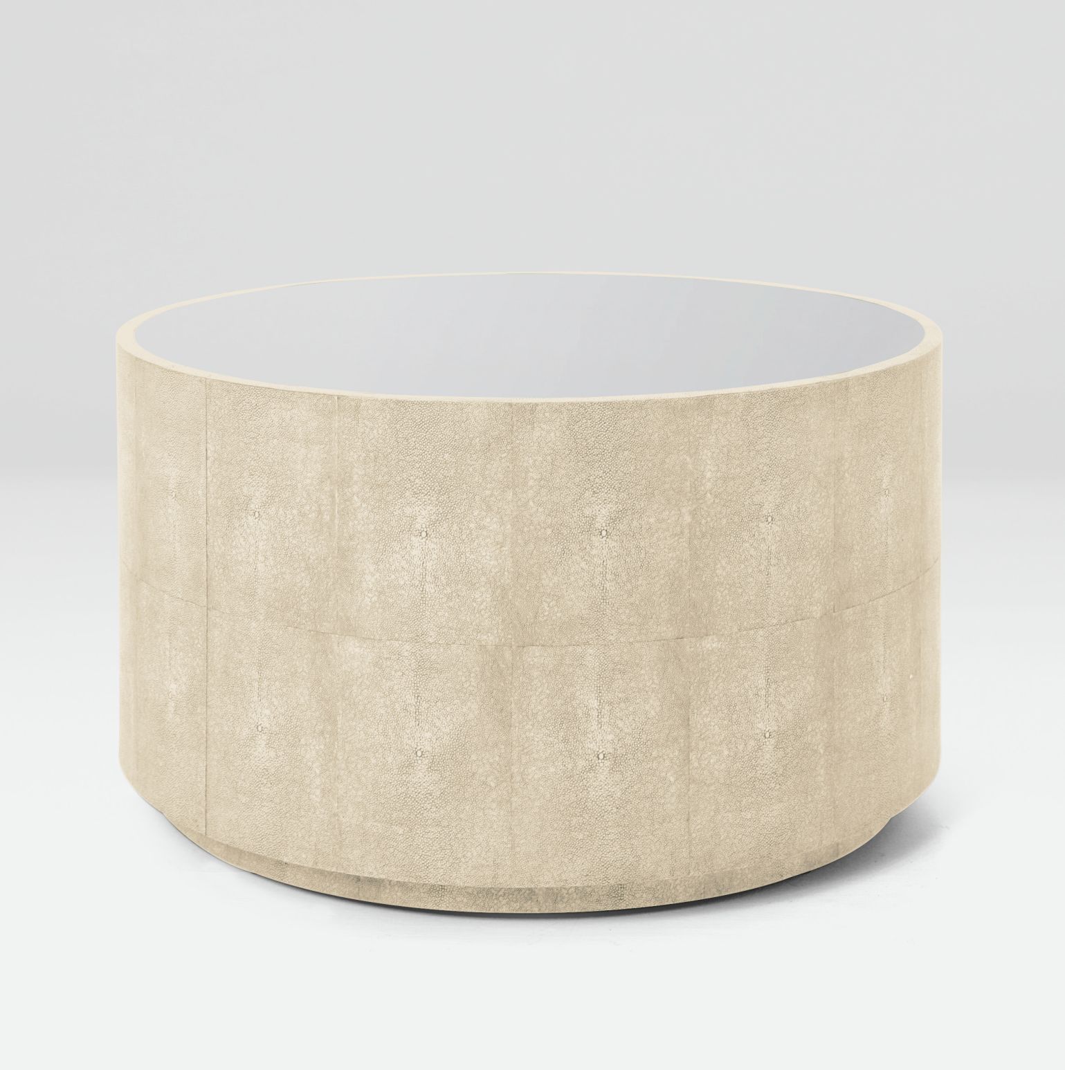 Ivory faux shagreen coffee table with antiqued mirror top against a white background